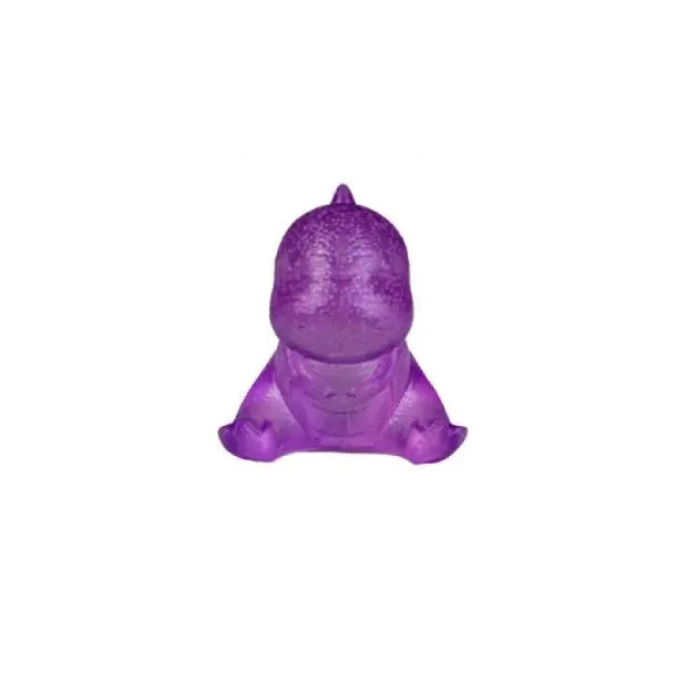 Purple dino squishy toy with translucent soft body on white background — Adventure Awaits