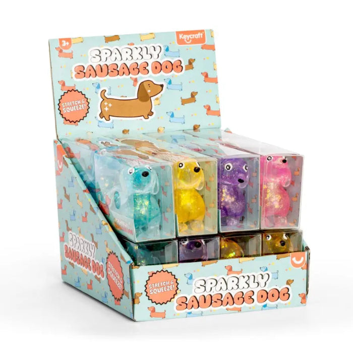 Keycraft Sparkly Sausage Dog squishy toys in colourful glitter designs displayed in retail packaging — Adventure Awaits