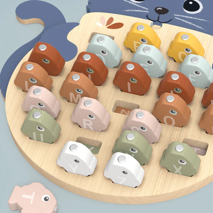 Wooden alphabet fishing game with pastel fish letters on cat-shaped board — Adventure Awaits