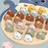 Wooden alphabet fishing game with pastel fish letters on cat-shaped board — Adventure Awaits