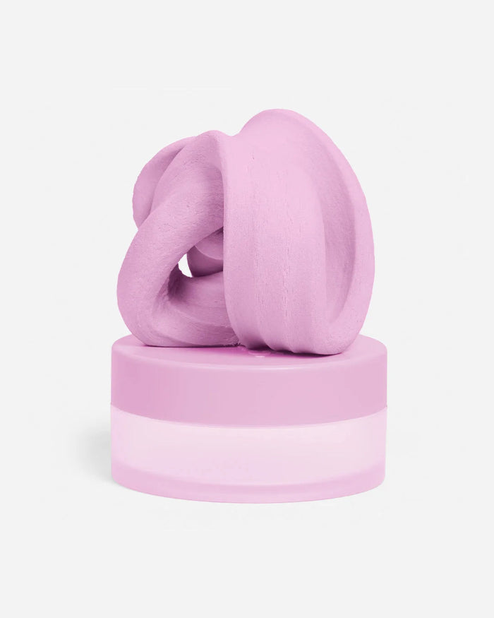 Pink SPEKS Blur calming focus putty twisted on its matching storage tub — Adventure Awaits