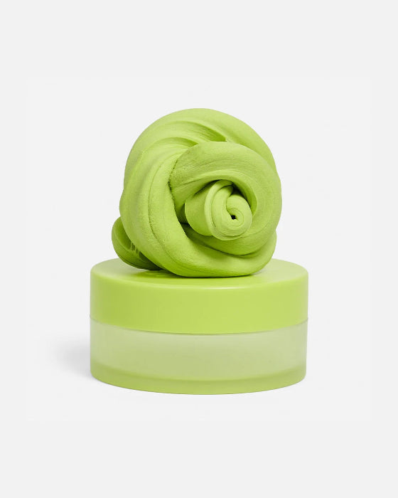 Lime green SPEKS Blur calming focus putty twisted on its matching storage tub — Adventure Awaits