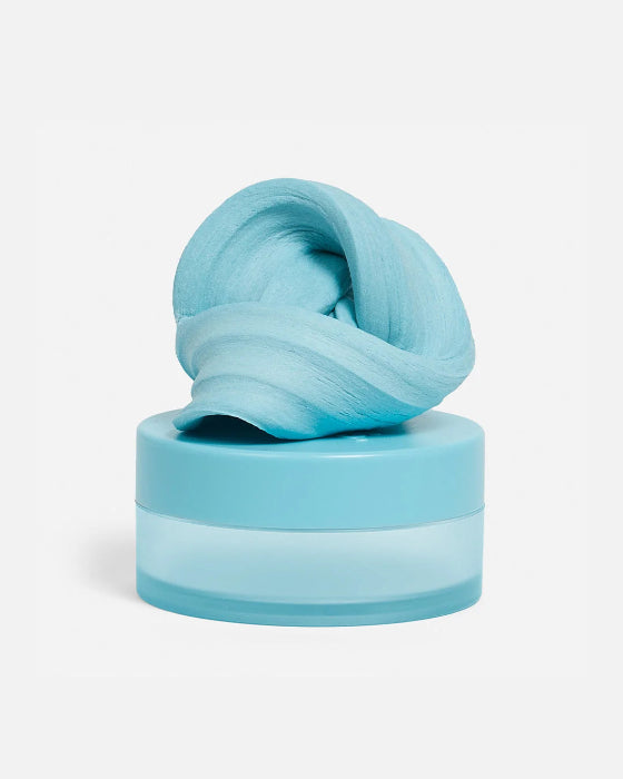 Light blue SPEKS Blur calming focus putty twisted on its matching storage tub — Adventure Awaits
