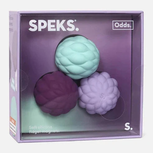 SPEKS Odds S soft silicone magnets in a purple retail box, featuring three textured spherical magnets in mint green, dark purple, and light lavender.