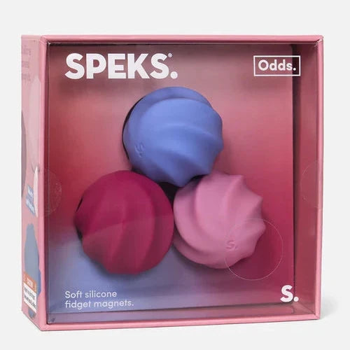 Speks Odds S soft silicone fidget magnets in a pink retail box, featuring three round magnets in blue, magenta, and pastel pink.