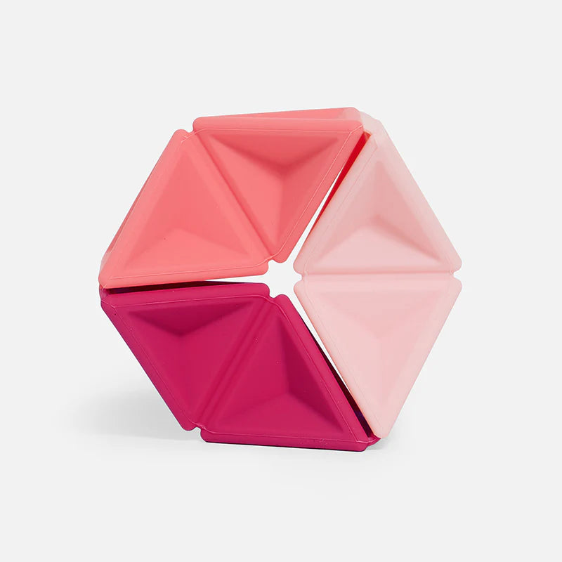 Speks Pivot Magenta silicone hexaflexagon fidget toy in pink and coral triangles