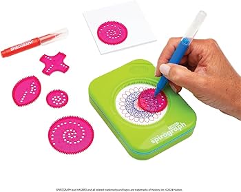 adult using travel spirograph with contents beside