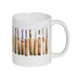 Sporting Nation white coffee mug with a line-up of vintage cricket bats — Adventure Awaits