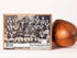 The Footballers Gift box with vintage team photo displayed beside a classic brown leather football — Adventure Awaits