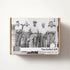 The Golfers Gift box featuring a vintage black-and-white photo of golfers and classic gift set branding — Adventure Awaits