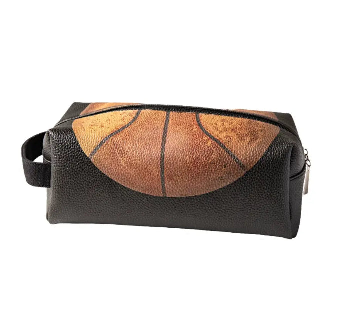 Black basketball wash bag with vintage orange basketball print and zip closure — Adventure Awaits