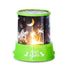 Dino Stars LED night light projector with green base and glowing dinosaur scene — Adventure Awaits