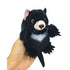 baby tassie devil in hand on white background