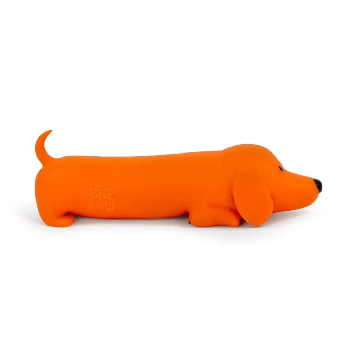 The Big Squii jumbo sausage dog squishy in bright orange with long body and floppy ears — Adventure Awaits