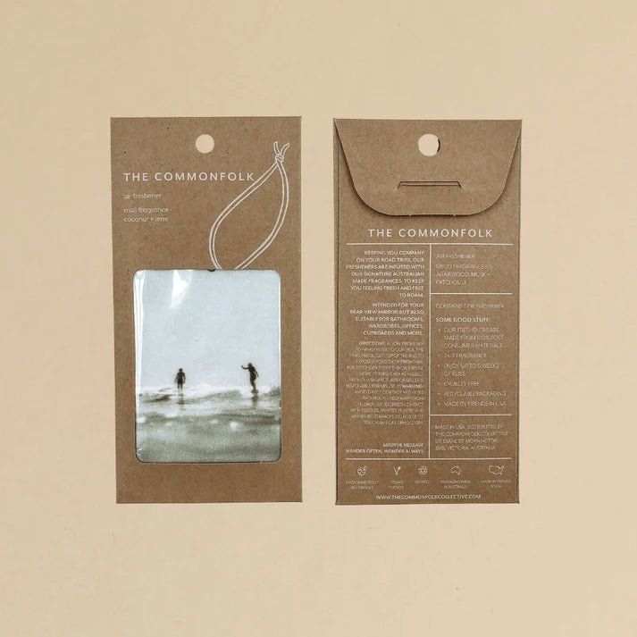 The Commonfolk party wave surfers boho hanging air freshener in packaging with mali scent of coconut and lime on a light background — Adventure Awaits