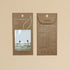 The Commonfolk party wave surfers boho hanging air freshener in packaging with mali scent of coconut and lime on a light background — Adventure Awaits