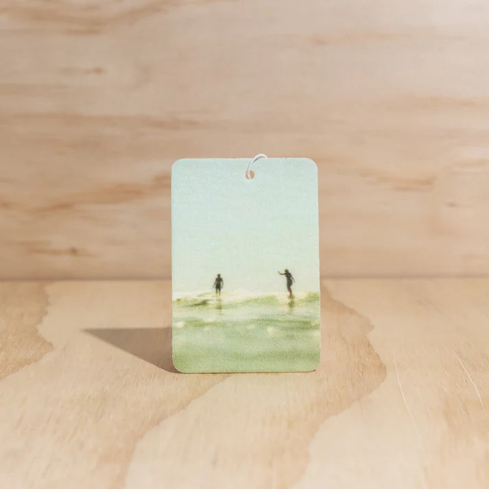 The Commonfolk party wave surfers boho hanging air freshener with mali scent of coconut and lime on a light timber background — Adventure Awaits