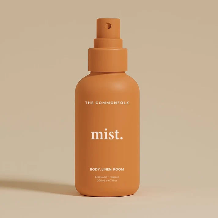 The Commonfolk Mist body, linen and room spray in burnt orange with teakwood & tobacco scent — Adventure Awaits