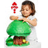 Child playing with a green toy treehouse, featuring the Popo logo.