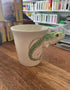 Cream rainbow trout mug with green spotted fish body and sculpted head handle — Adventure Awaits
