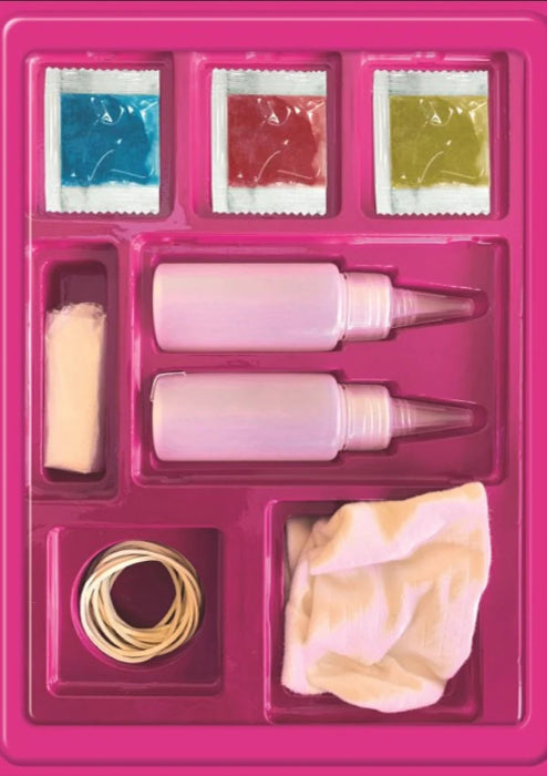Tie-dye kit supplies in pink tray with dye powders, bottles and rubber bands — Adventure Awaits
