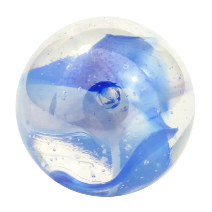 Clear glass marble with blue star shape suspended inside — Adventure Awaits