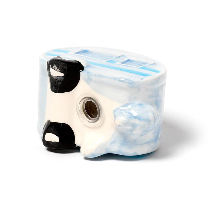 Ceramic caravan salt shaker underside with refill stopper hole and blue stripe details — Adventure Awaits