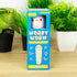 Worry Worm stress reliever in blue gift box on shelf with green plants — Adventure Awaits