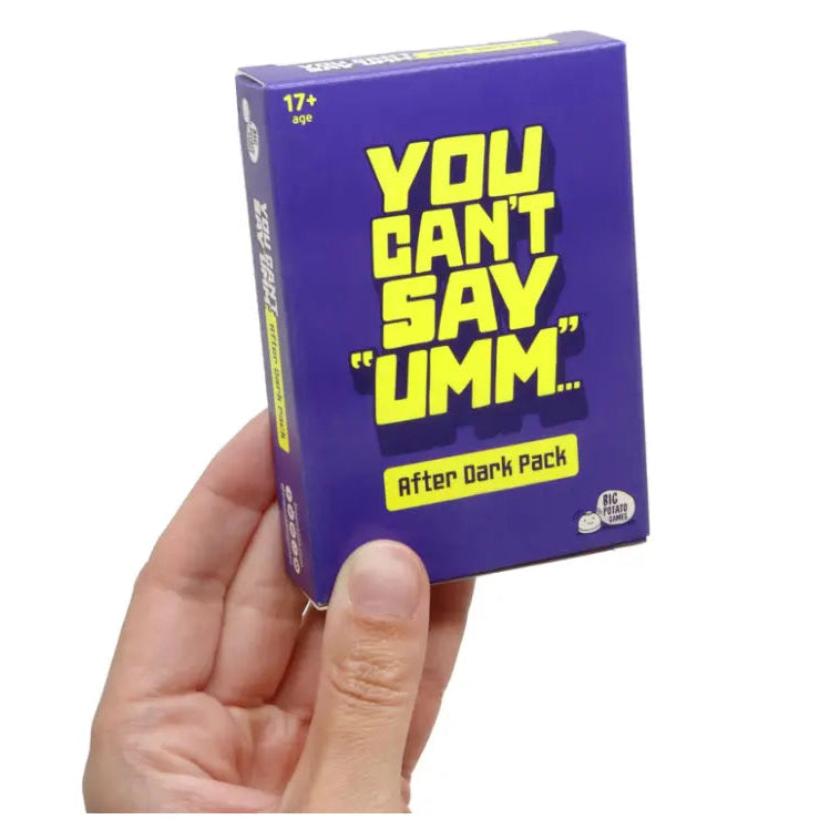 Hand holding You Can't Say Umm After Dark Pack in purple box for ages 17+ — Adventure Awaits
