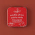 Red tin of Mindful Advent Activity Cards with 30 festive family and nature prompts — Adventure Awaits