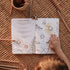 Child completing daisy puzzles and colouring in the Wild Activity Book with pencils — Adventure Awaits