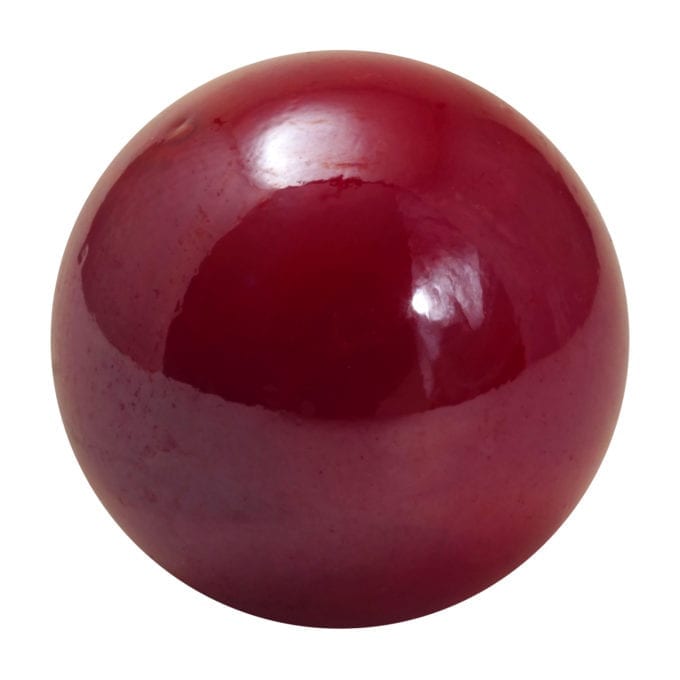 Pearlescent red glass marble with a smooth reflective finish — Adventure Awaits