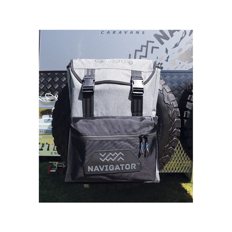 Navigator grey and black caravan backpack hanging on spare wheel — Adventure Awaits
