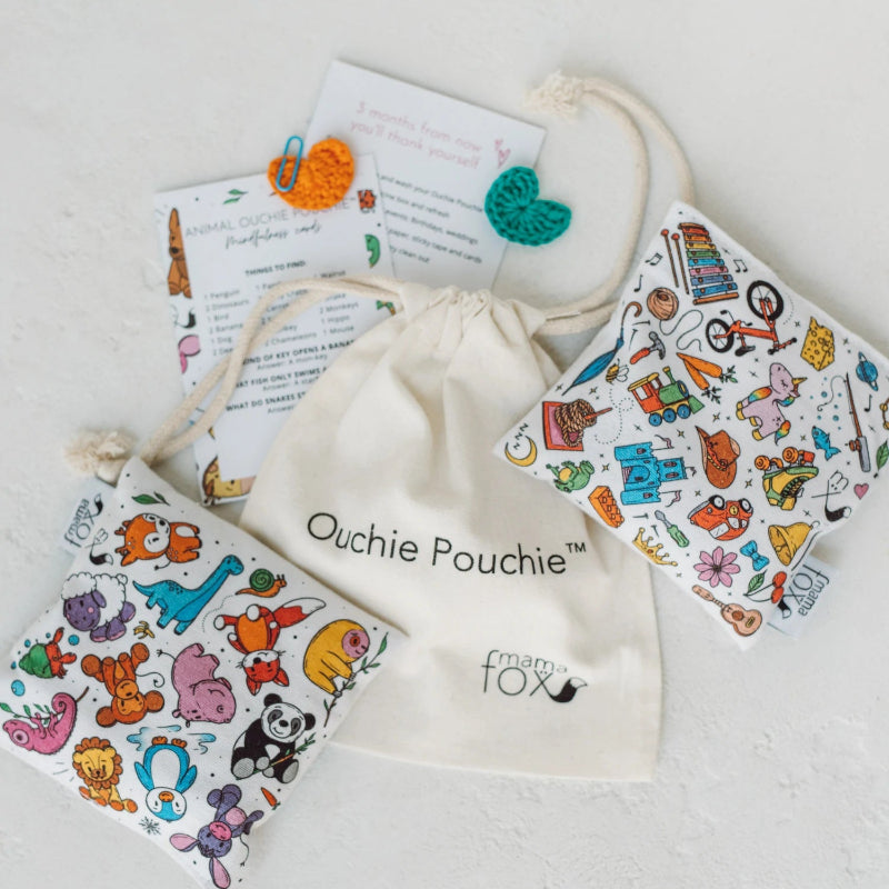 Ouchie Pouchie cold pack with illustrated pouches, cotton drawstring bag and activity cards — Adventure Awaits