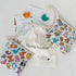 Ouchie Pouchie cold pack with illustrated pouches, cotton drawstring bag and activity cards — Adventure Awaits