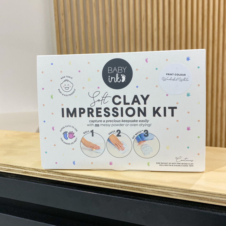 soft clay impression kit packaging shown on timber counter with timber background