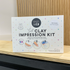 soft clay impression kit packaging shown on timber counter with timber background