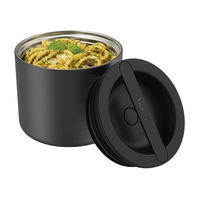 Open black Bentgo Stainless insulated food container filled with pesto pasta beside its lid — Adventure Awaits