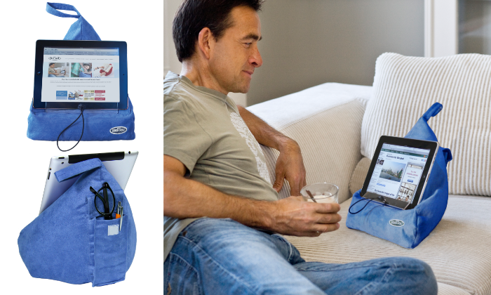 Blue The Book Seat holding a tablet for hands-free reading on the couch — Adventure Awaits