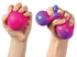 Hands squeezing a pink NeeDoh colour-change sensory ball as purple bubbles pop out, Adventure Awaits