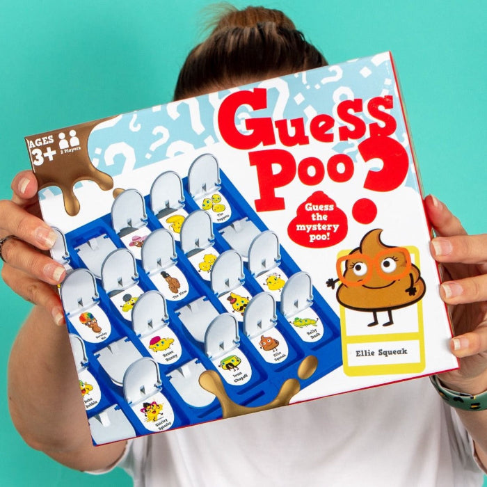 Person holding Guess Poo? mystery guessing game box with cartoon toilets and poo character — Adventure Awaits