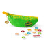 My First Bananagrams kids word game with green banana pouch and colourful lowercase letter tiles — Adventure Awaits