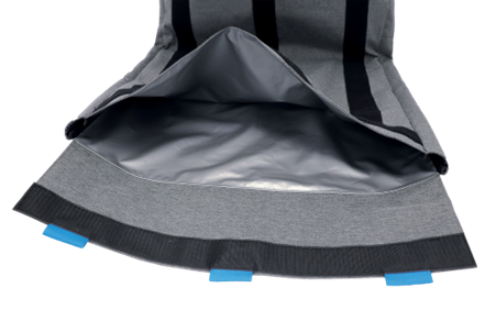 Navigator caravan storage bag open with grey lining and blue tabs — Adventure Awaits