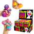 Hands squeezing colourful NeeDoh colour-change sensory balls beside the display box, Adventure Awaits