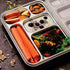 nestling stainless steel bento box with salad, carrots, fruit, yoghurt and nuts Adventure Awaits