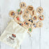 Pirate memory game with wooden discs and drawstring storage bag — Adventure Awaits