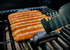 sausage mate on the grill cooking sausages perfectly - Adventure Awaits