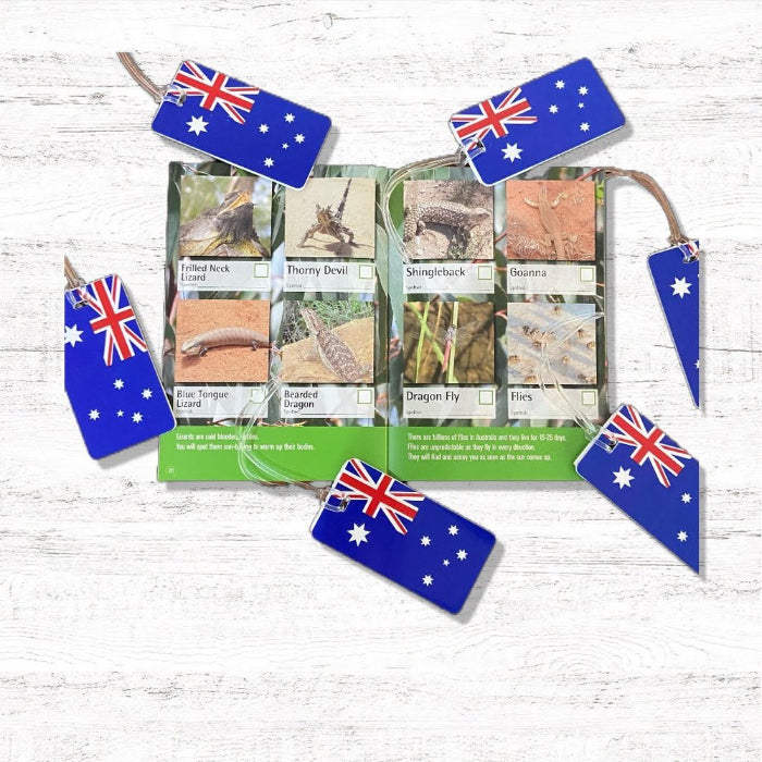 Spotto Books Australia open to reptile and insect spotting pages with Aussie flag tags — Adventure Awaits