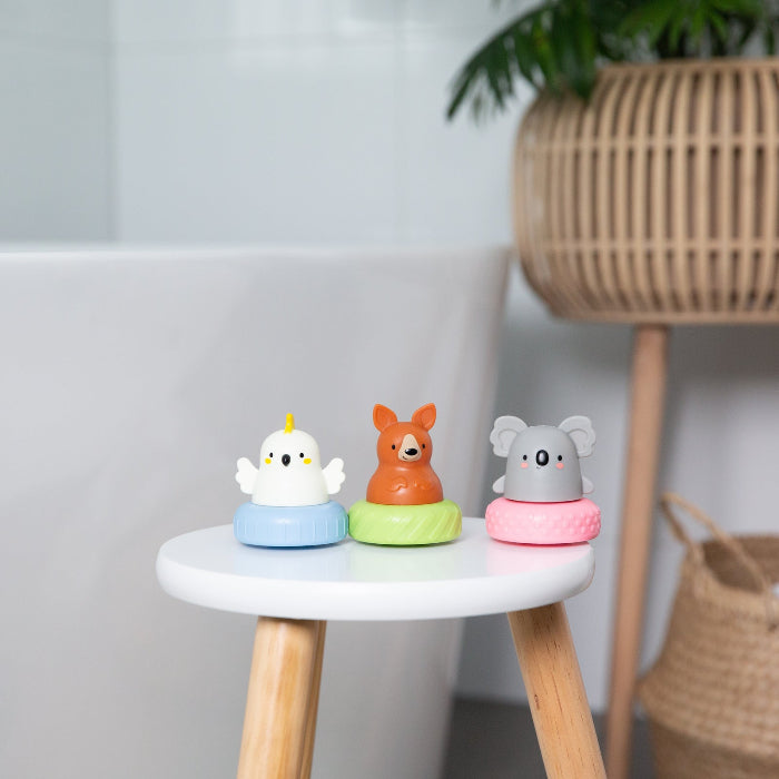 Tiger Tribe Mix & Match Bath Mates with cockatoo, kangaroo and koala toys displayed beside a bath — Adventure Awaits