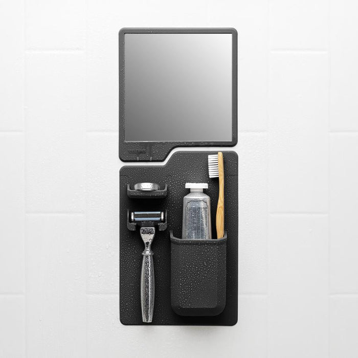 tooletries harvey and oliver set on white background with toiletries on the holder